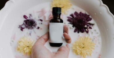 person holding bottle